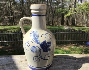 Vintage Pottery Jug With Blue Flowers And Swirl Design