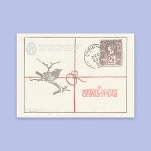 May include: A rectangular cream-colored postcard featuring a brown illustration of a bird on a branch, a red string tied in a cross pattern, a vintage-style postage stamp, a circular postmark, and the red text A MERRY MERRY CHRISTMAS.