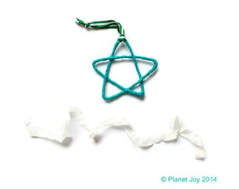 Wire star wrapped in plain fabric