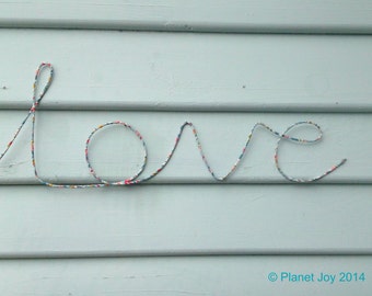 Wire 'love' wrapped in Liberty of London fabric