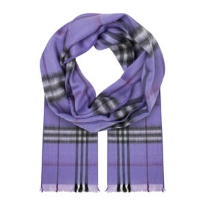 May include: A soft lavender scarf featuring a classic plaid pattern in shades of black, white, and dark purple. The scarf has a looped design at the top with two long, straight ends hanging down, each finished with a delicate, short fringe edge.