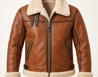 Chaqueta de aviador de cuero color marrón claro con forro de piel sintética color crema y ribetes en contraste.