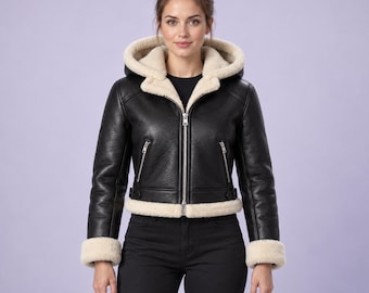 Chaqueta corta de cuero negra con capucha estilo aviador para mujer, con forro de piel sintética.