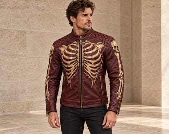 Bordeauxrode jas met skeletmotief, gouden gotische ribbels en gewatteerde schouders.
