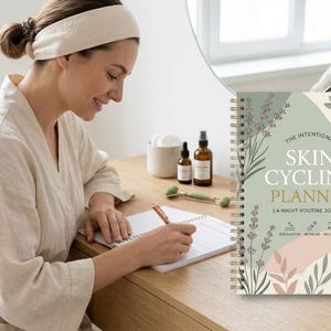 May include: A spiral-bound Skin Cycling Planner with a sage green, cream, and soft pink cover featuring botanical illustrations of lavender and eucalyptus leaves, with text reading The Intentional Skin Cycling Planner 4-Night Routine Journal.