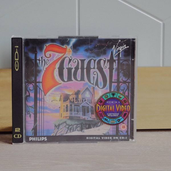 Le jeu 7th Guest CD-i - Jeu interactif Philips CD-i en très bon état avec manuel et disque de bande sonore bonus