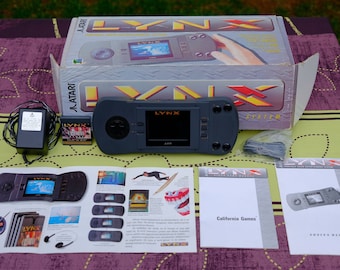 Authentic Atari Lynx Model I console from 1990 - CIB - In original box with all accessories, manuals and game "California Games" included