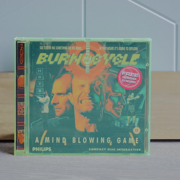 jeu CD-i vintage « Burn:Cycle » - Jeu interactif Philips CD-i en très bon état avec manuel et disque de bande sonore bonus