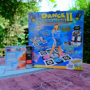 Authentic Sony PlayStation game Dancing Stage EuroMix European PAL version CIB With the original box, manual and dance mat peripheral image 2