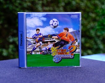 Authentic Sega Dreamcast game “Virtua Striker 2 - Ver.2000.1” (European PAL version) CIB -Game from 1997 - Complete with the box + manual.