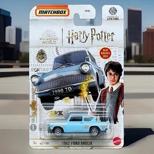 May include: A Matchbox 1962 Ford Anglia die-cast toy car in light blue, packaged on a Harry Potter themed card. The packaging features an illustration of the car, a portrait of Harry Potter, the text Wizarding World, and New Nouveau 2024.