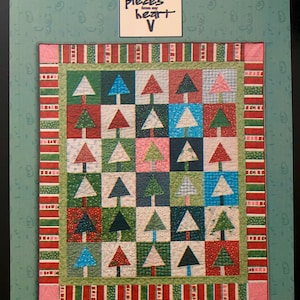 May include: A quilt pattern featuring a patchwork of colourful Christmas trees. The pattern is called "#445 Trees for Sale" and is a "Layer Cake™ pattern".