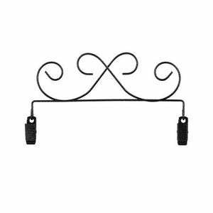 May include: Black metal curtain rod with decorative scrollwork and two black clips at the ends.