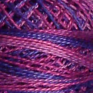 May include: A skein of purple and pink embroidery floss.