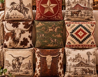 May include: A collection of nine square throw pillows featuring Western-themed designs, including a cowboy on horseback, a large star, a farm landscape, a longhorn cow, a steer skull, and geometric patterns in shades of brown, red, and green.