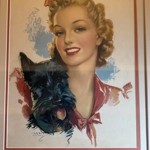May include: A framed vintage-style print featuring a blonde individual with a red hair bow and a red top, positioned next to a black Scottish Terrier. The artwork includes blue and red paint-like accents and the signature JERBIT in the corner.