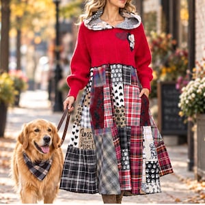 May include: A red long-sleeve hooded dress featuring a patchwork skirt with plaid, heart, and paw print patterns. The skirt includes a panel with the text 'Dogs are my favourite people'. A golden retriever wears a matching plaid bandana on a leash.