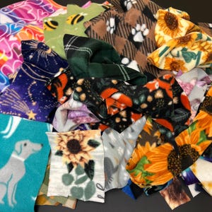 Assorted Fleece Fabric Scraps Multiple Prints  Deluxe Fleece Blizzard Fleece Mixed Large Bag + Plaid Woven Cotton Fabric