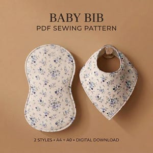 May include: A baby bib PDF sewing pattern featuring two styles with a cream fabric base and a small blue and purple floral print. The text reads BABY BIB PDF SEWING PATTERN and 2 STYLES A4 + A0 DIGITAL DOWNLOAD.