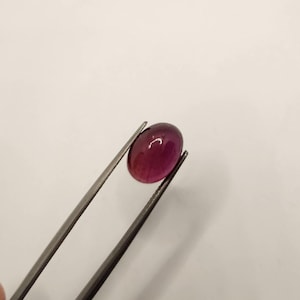 VARDHMAN GEMS 7.65 Ct Glass Filled Ruby Cabochon, Magenta Red Oval Smooth Manik Stone