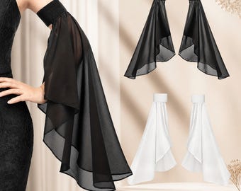 May include: A pair of arm sleeves featuring a solid elasticized upper band and a long, flowing, sheer fabric extension. The set includes two black arm sleeves and two white arm sleeves, each designed to drape elegantly from the upper arm.