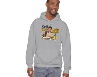 Sudadera con capucha unisex Heavy Blend™ con cita de Phil Dunphy (Modern Family) sobre Lemonade.