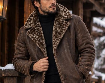 May include: A brown distressed leather coat with a wide, textured faux fur lapel and collar. The coat features a long-line silhouette, long sleeves, and a button-front closure, worn over a black turtleneck sweater and black trousers.