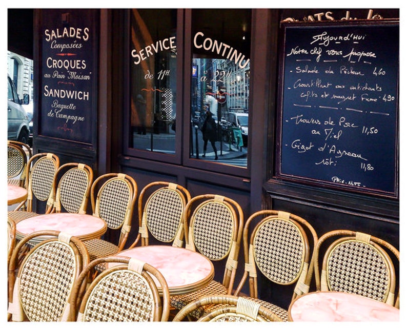 Paris cafe photography print with bistro chairs and marble tables. 