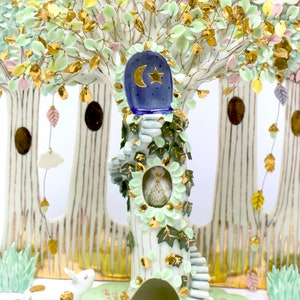 Up the winding staircase into the starlit night sky / Ceramic animal sculpture