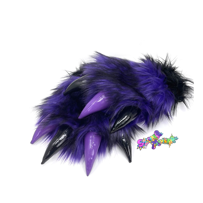May include: A pair of purple and black faux fur claws with black and purple claws. The claws are made of a soft, plush material and are perfect for adding a touch of whimsy to any costume.