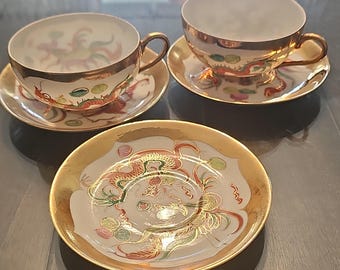 Filiżanki i spodki z porcelany w kolorze skorupki jajka z ręcznie malowanym chińskim smokiem