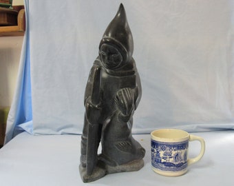 1977 Inuit Seal Hunter + dog carved Stone Sculpture 15 inch unsigned Povungnituk area soapstone eskimo