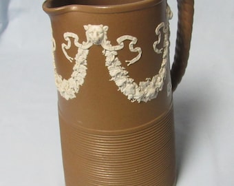 Antique 8 1/2 inch  pre 1860 James Dudson Brown Jasperware Pitcher Tankard Lions and Garland design