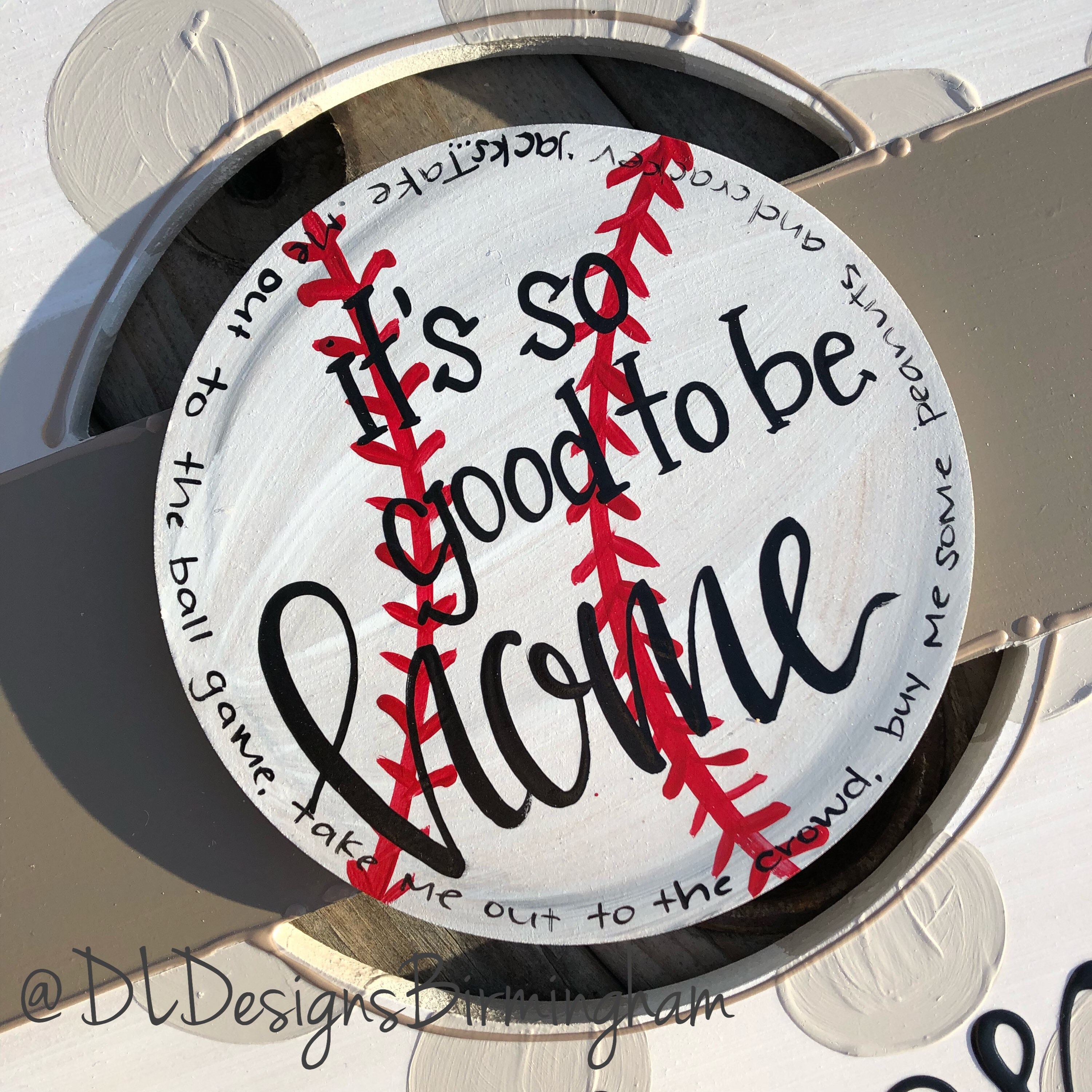 Baseball or softball door hanger attachment