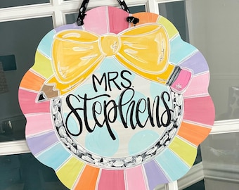 teacher door hanger hand lettered circle rainbow pencil colorful classroom decor