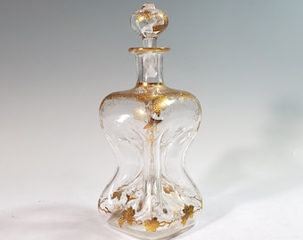Antique 100 plus years decanter with gilded vines and air twist. Pre Kluk Kluk or holmegard style. Cordial size.