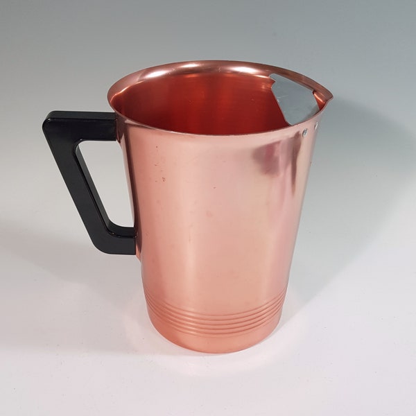 Vintage mid century copper anodized aluminum water pitcher with ice guard