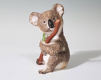 Handpainted Porcelain Koala with ladybug figurine