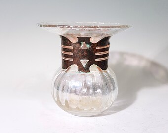 Blown glass vase with a rustic copper collar and aurora borealis finish
