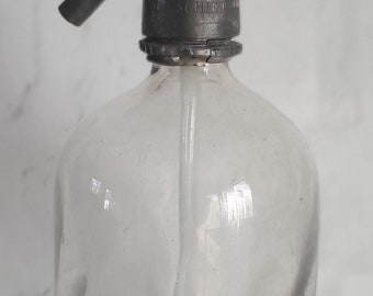 Antique Vintage Twisted Swirled Waves Seltzer Bottle Soda Water Seltzer Water Bottle Siphon Bottle Clear  This has a J. A. Schiet top