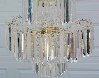 Seven Tier Lucite and Brass Waterfall Chandelier Circa 1970s