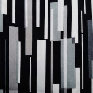 May include: Abstract geometric pattern fabric with vertical stripes in black, white, and gray.