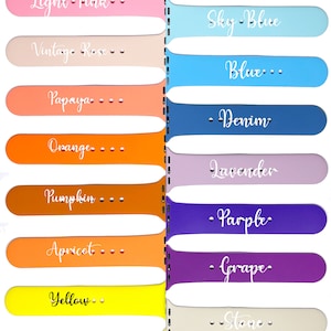 May include: A set of 16 Apple Watch bands in various colors, with each band labeled with a color name. The colors include red, rose red, red wine, light pink, vintage rose, papaya, orange, pumpkin, apricot, yellow, pale yellow, white, black, lime, turquoise, mint, sky blue, blue, denim, lavender, purple, grape, stone, concrete, coco, and dark olive.