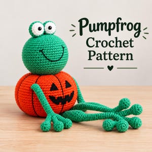 May include: A green crocheted frog with large white eyes sitting on an orange crocheted pumpkin body with a black jack-o'-lantern face. The text Pumpfrog Crochet Pattern is displayed in dark green lettering next to the stuffed toy figure.