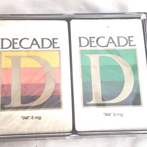 Juego de cartas de cigarrillos Decade, 2 barajas, envase de plástico sellado, vintage