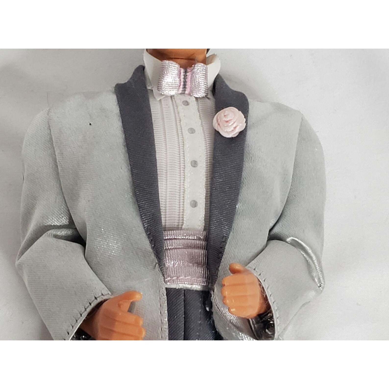 ken doll in a suit