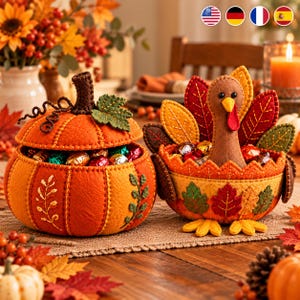 May include: A felt pumpkin-shaped container with a lid and a felt turkey-shaped bowl, both filled with wrapped candies. The pumpkin is orange with green leaf accents, while the turkey features colorful felt feathers and a brown body.