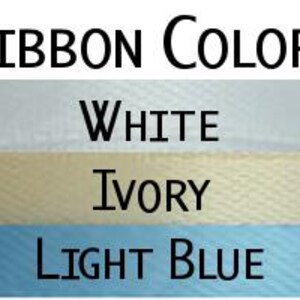 a white and blue ribbon with the words ribbon colors white ivory light blue