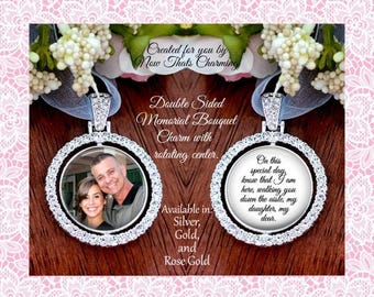 May include: A double-sided circular memorial bouquet charm featuring a rotating center framed by clear crystals. One side displays a photograph of a man and a woman, while the other side features the text: On this special day, know that I am here, walking you down the aisle, my daughter, my dear.