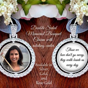 May include: A double-sided memorial bouquet charm featuring a rotating center framed by clear crystals. One side displays a photograph of a person, while the other side features the text: Those we love don't go away, they walk beside us every day.